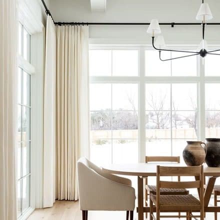 Custom drapery installation, South Florida home
